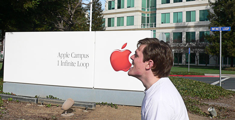 Daniel eating the Apple logo