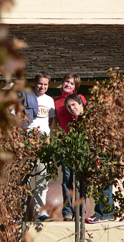 Three interns in a vineyard