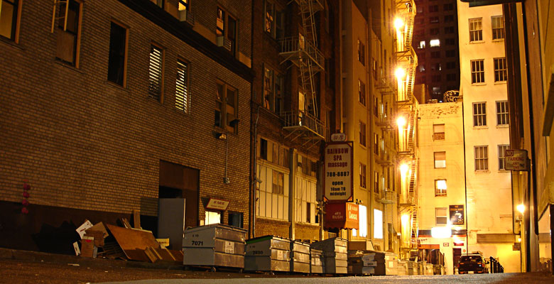 Dumpsters in an alley