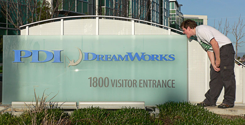 Daniel eating the Dreamworks sign