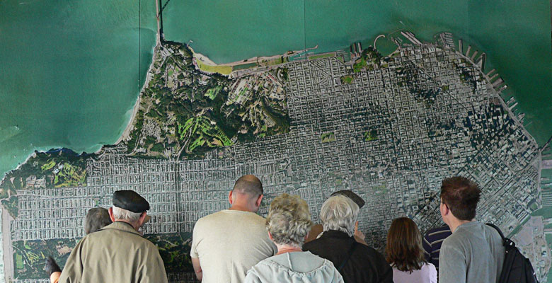 People looking at gigantic San Francisco map
