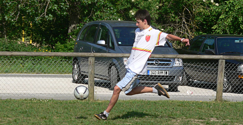 Florian kicks the soccer ball