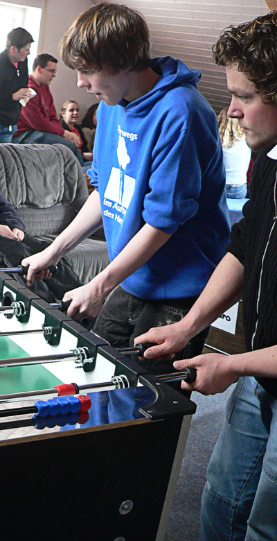 Daniel playing foosball