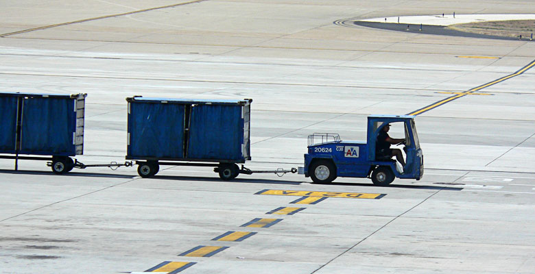 Airport vehicle transporting luggage